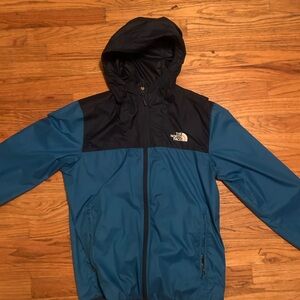 blue windbreaker jacket